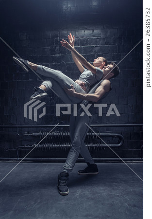 Inspired young dancers performing together 26385732