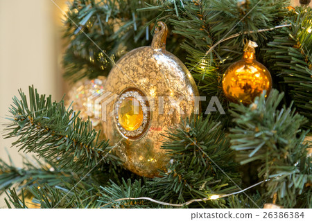 Christmas decorations on the branches of fir tree Christmas decorations on the branches of fir tree 26386384