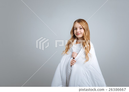 Cute happy girl standing with blanket 26386667