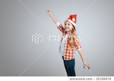 Smiling little girl celebrating christmas 26386676