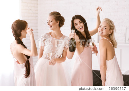 Laughing young girls having fun at home Laughing young girls having fun at home 26399317