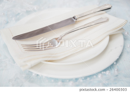 Festive table with white crockery Festive table with white crockery 26400303