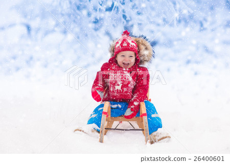 Kids play in snow. Winter sleigh ride for children 26400601