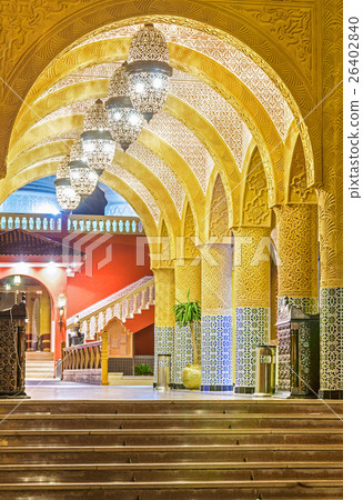 Arches of a corridor of a brick street 26402840