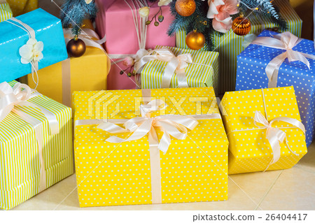 Christmas living room with Christmas tree and gift Christmas living room with Christmas tree and gift 26404417