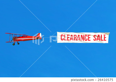 Flying airplane and Sale banner on blue sky. Flying airplane and Sale banner on blue sky. 26410575