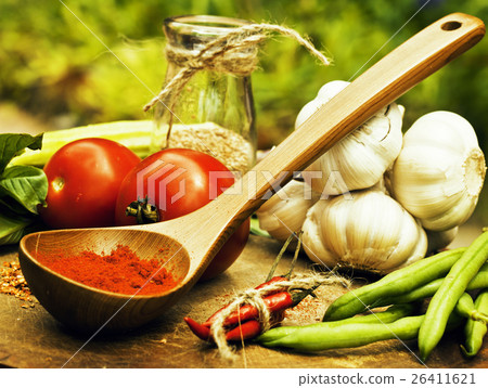 vegetables on wooden kitchen with spicies, tomato vegetables on wooden kitchen with spicies, tomato 26411621