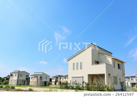 A beautiful blue sky and a newly built house 26412597