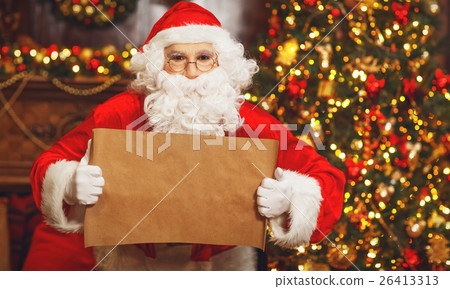 concept. Santa Claus and blank list concept. Santa Claus and blank list 26413313