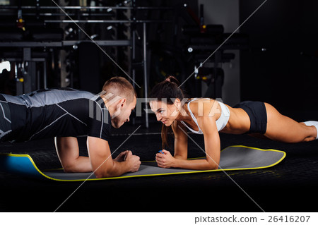 Woman doing abdominal crunches press exercise on Woman doing abdominal crunches press exercise on 26416207