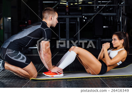 Woman doing abdominal crunches press exercise on 26416349