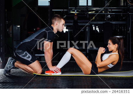 Woman doing abdominal crunches press exercise on 26416351
