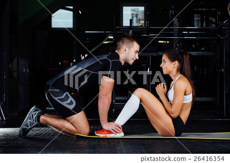 Woman doing abdominal crunches press exercise on Woman doing abdominal crunches press exercise on 26416354