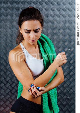 Beautiful young fitness woman feeling pain. Beautiful young fitness woman feeling pain. 26416897
