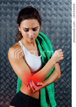 Beautiful young fitness woman feeling pain. Beautiful young fitness woman feeling pain. 26416898