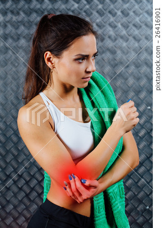 Beautiful young fitness woman feeling pain. Beautiful young fitness woman feeling pain. 26416901