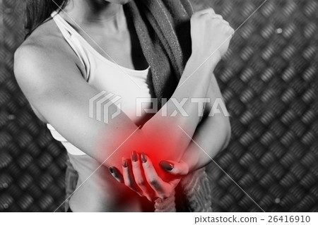 Beautiful young fitness woman feeling pain. 26416910