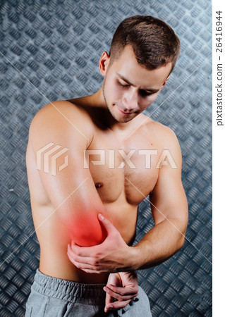 Strong fitness man feeling pain. 26416944