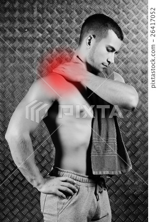 Strong fitness man feeling pain. 26417052