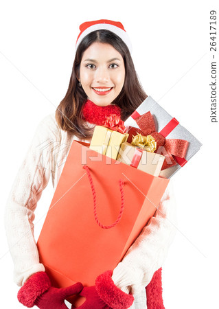 Pretty asian woman hands many presents christmas Pretty asian woman hands many presents christmas 26417189