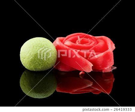 Ginger and wasabi over black background Ginger and wasabi over black background 26419333