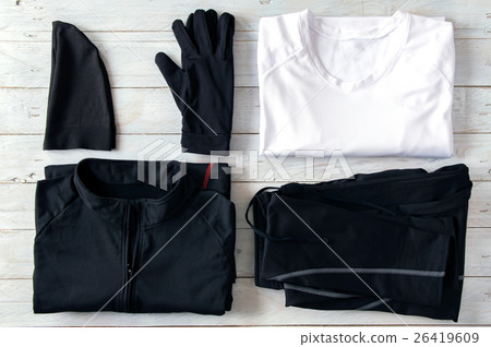 Jogging clothes stacked on a wooden board 26419609