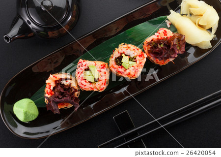 Sushi with shrimp and red tobiko in mamenori  26420054
