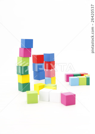 Boy playing with building blocks Boy playing with building blocks 26420537