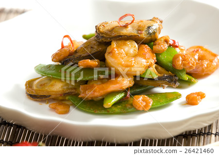 seafood with green pods and red wine seafood with green pods and red wine 26421460