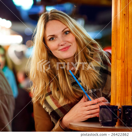 woman drinking hot punch on German Christmas woman drinking hot punch on German Christmas 26422862