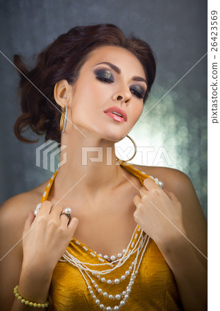 Beautiful woman with perfect makeup wearing Beautiful woman with perfect makeup wearing 26423569