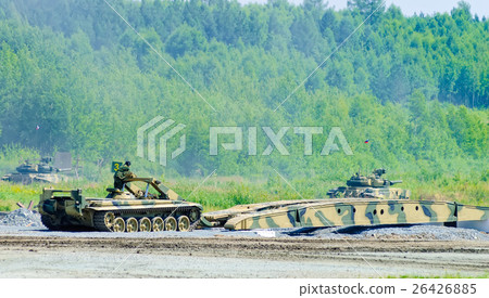Bridge layer MTU-72 in action under tank cover Bridge layer MTU-72 in action under tank cover 26426885