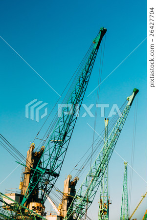 Old Heavy Loading Cranes In Port Dock Old Heavy Loading Cranes In Port Dock 26427704