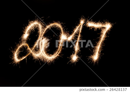 2017 written in sparklers . Happy New Year ! 2017 written in sparklers . Happy New Year ! 26428137