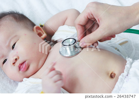 Pediatrician examining infant. Illness baby girl  26438747