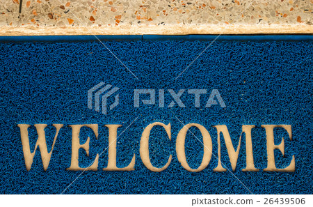 welcome carpet at the door texture background. 26439506