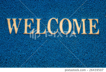 welcome carpet at the door texture background. 26439507