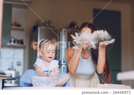 mother and daughter in the kitchen mother and daughter in the kitchen 26440971
