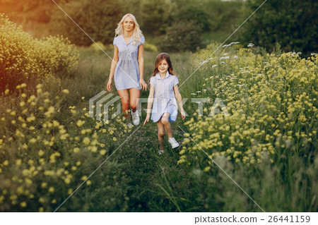 mom and daughter outside 26441159