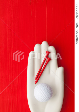 Detail of artifical hand with golf equipments Detail of artifical hand with golf equipments 26444438