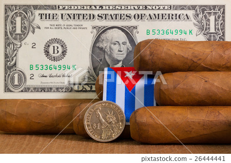 Luxury Cuban cigars with US dollar banknote Luxury Cuban cigars with US dollar banknote 26444441