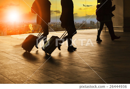 people and traveling luggage in airport terminal people and traveling luggage in airport terminal 26444936