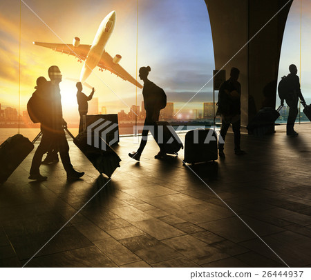 people and traveling luggage in airport terminal people and traveling luggage in airport terminal 26444937