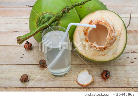 Fresh Coconut Water Drink in glass with coconut le Fresh Coconut Water Drink in glass with coconut le 26445962