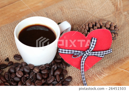 Coffee with coffee beans and red hearts. 26451503