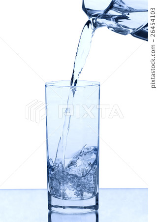 Pouring water into the glass 26454103