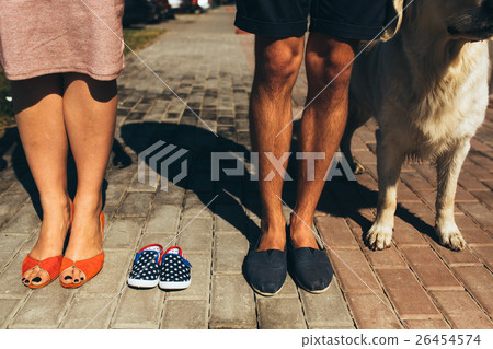 Closeup of female and male feet in casual shoes 26454574