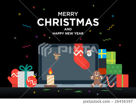 Laptop with gifts, candles, red ball and Christmas 26456397