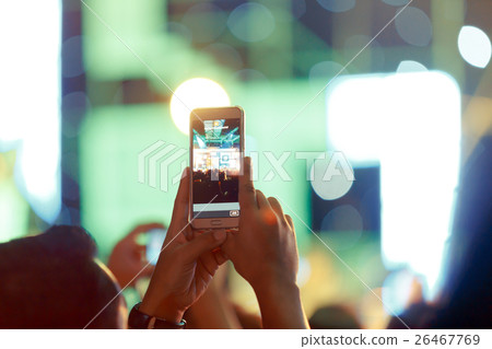 Take photo crowd in front of concert stage Take photo crowd in front of concert stage 26467769