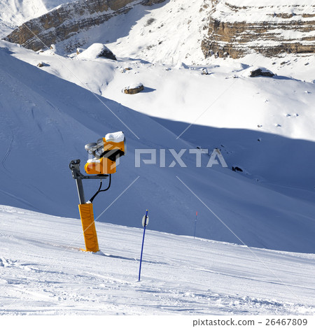 Ski slope with snowmaking on winter resort 26467809